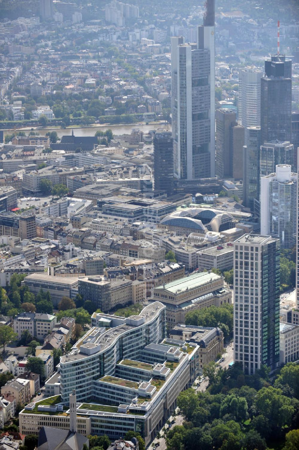 Aerial photograph Frankfurt am Main - The Frankfurter Welle is a biuling complex in the shape of a wave and was built between 1998 and 2003. It contains offices, restaurants, retail trade, and apartements