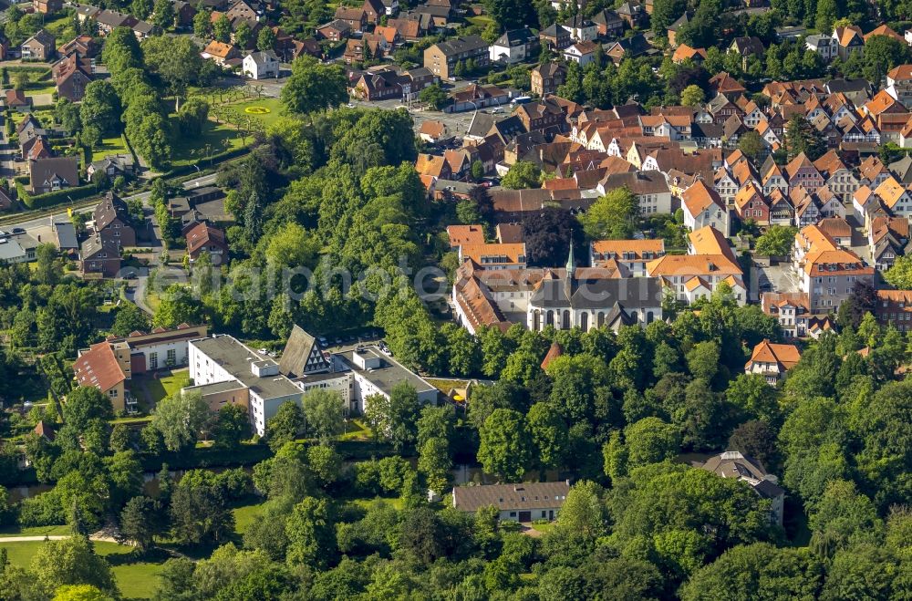 Aerial image Warendorf - The buildings and the grounds of the Franciscan monastery in front of a residential area in Warendorf in the state North Rhine-Westphalia