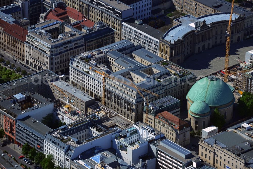 Berlin from the bird's eye view: The French street in the Mitte district of Berlin is a prestigious address for hotels, offices and administrations. Here you will find, among other things, the luxury Hotel de Rome and the Robert Bosch Stiftung. The green dome is St. Hedwig's Cathedral, the Catholic Bishops' Church of Berlin. On Bebelplatz is the Old Library in today from the Law Faculty of the Humboldt University of Berlin has its headquarters