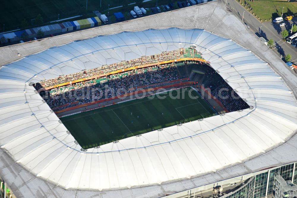 Aerial photograph Wolfsburg - WM-Fußballspiel zwischen Mexico und England anläßlich der Fußball-Weltmeisterschaft der Frauen 2011 in der Volkswagen-Arena. Aus werberechtlichen Gründen heißt das Stadion während des Tuniers Arena im Allerpark Wolfsburg in Niedersachsen. Die 6. Fußball-Weltmeisterschaft der Frauen (offiziell: FIFA Women’s World Cup Germany 2011 / „ FIFA Frauen-Weltmeisterschaft Deutschland 2011 “) wird vom 26. Juni bis 17. Juli 2011 im Land des Titelverteidigers Deutschland ausgetragen. Football match of the FIFA Women’s World Cup 2011 in the Stadium Arena im Allerpark Wolfsburg in Lower Saxony.