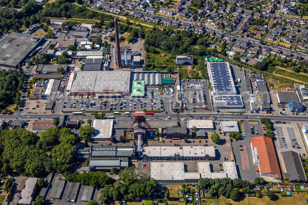 Aerial image Moers - Conveyors and mining pits at the headframe of the former Zeche Rheinpreussen on Zechenstrasse with industrial estate in the industrial area Rheinpreussenpark along the Franz-Haniel-Strasse in Moers in the state North Rhine-Westphalia, Germany