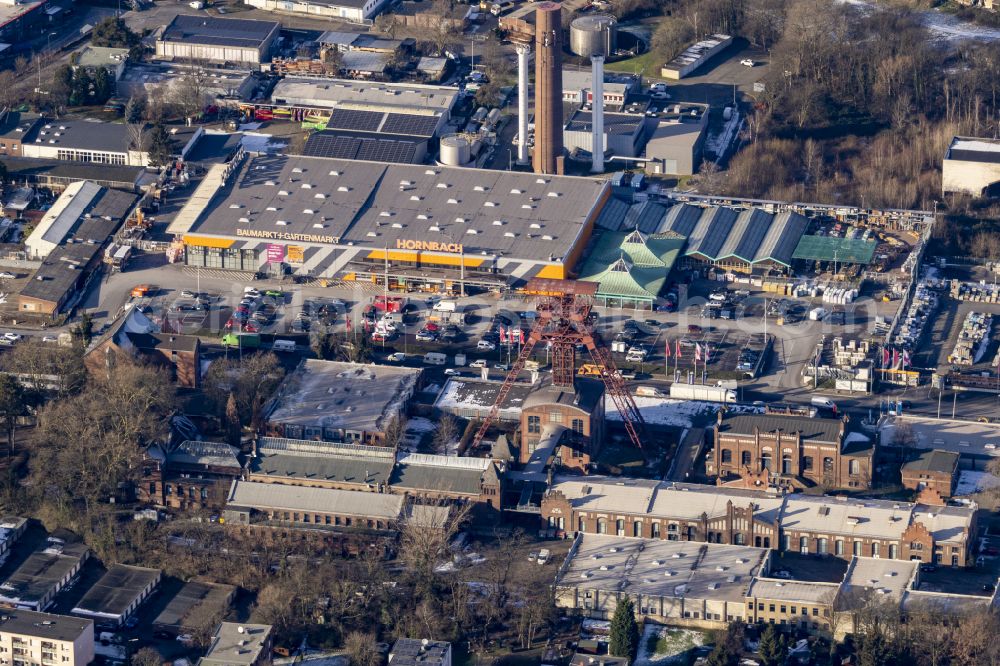 Aerial image Moers - Conveyors and mining pits at the headframe of the former Zeche Rheinpreussen on Zechenstrasse with industrial estate in the industrial area Rheinpreussenpark along the Franz-Haniel-Strasse in Moers in the state North Rhine-Westphalia, Germany