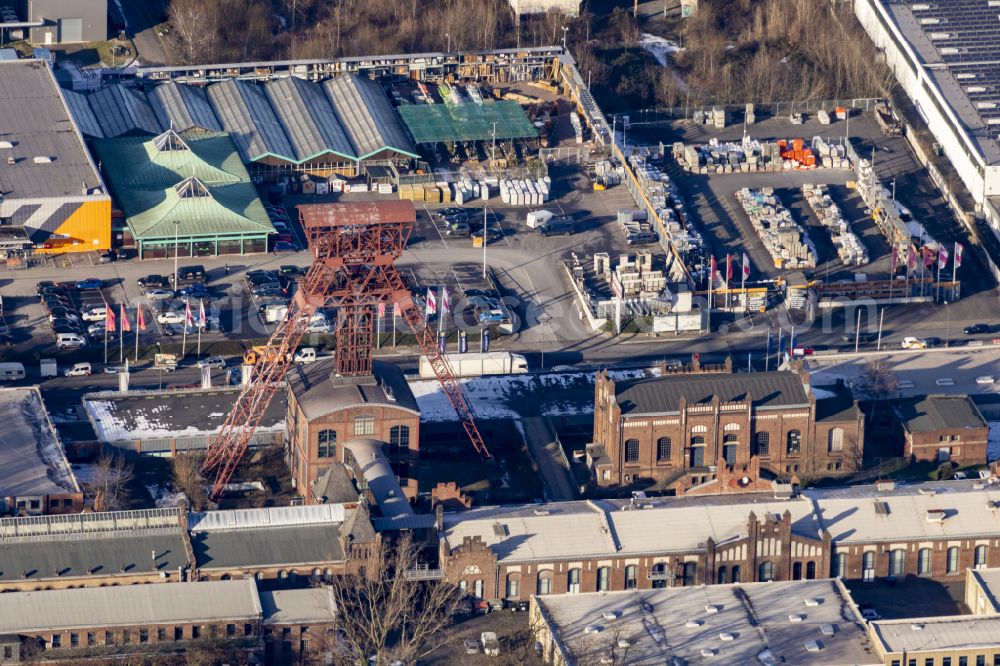 Moers from above - Conveyors and mining pits at the headframe of the former Zeche Rheinpreussen on Zechenstrasse with industrial estate in the industrial area Rheinpreussenpark along the Franz-Haniel-Strasse in Moers in the state North Rhine-Westphalia, Germany