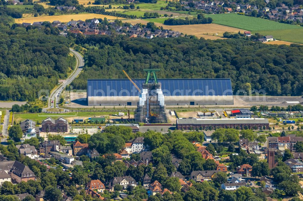 Dinslaken from above - Conveyors and mining pits at the headframe of Zentralwerkstatt Zeche Lohberg in Dinslaken at Ruhrgebiet in the state North Rhine-Westphalia, Germany