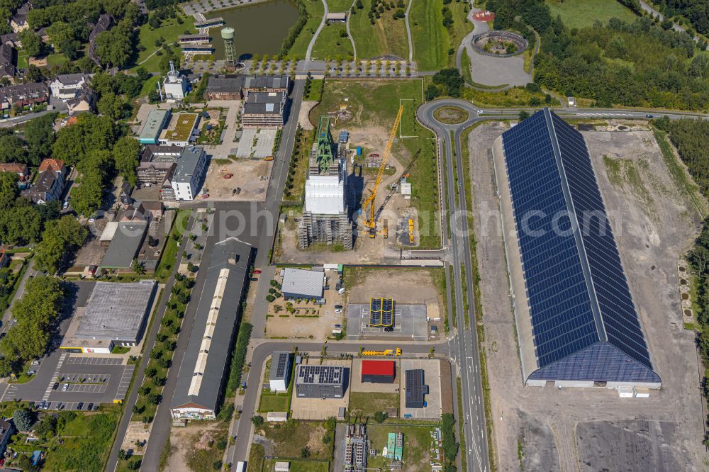 Dinslaken from above - Conveyors and mining pits at the headframe of Zentralwerkstatt Zeche Lohberg in Dinslaken at Ruhrgebiet in the state North Rhine-Westphalia, Germany