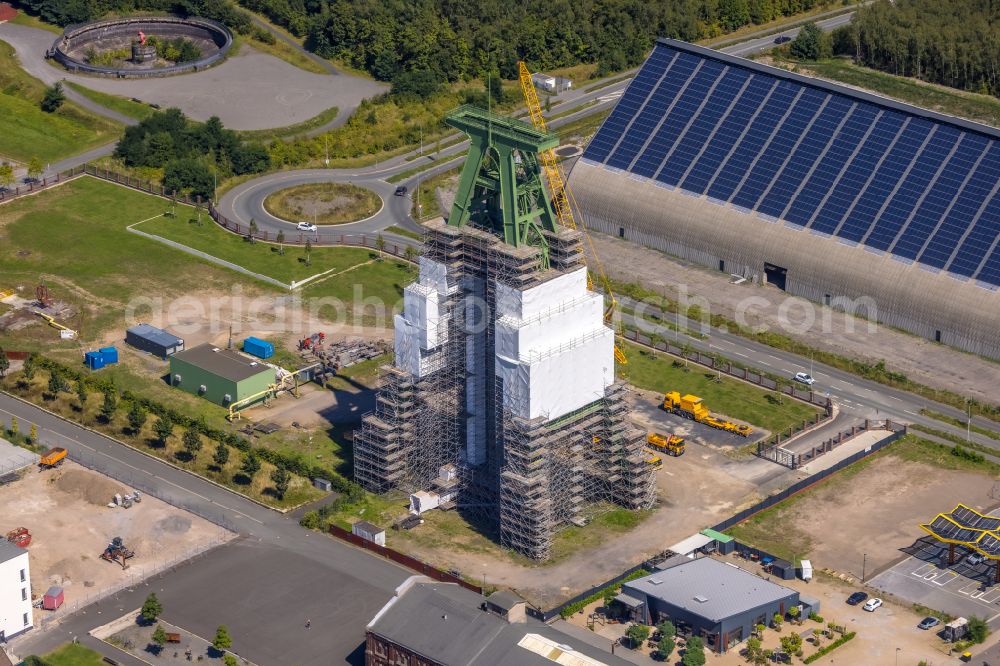 Dinslaken from above - Conveyors and mining pits at the headframe of Zentralwerkstatt Zeche Lohberg in Dinslaken at Ruhrgebiet in the state North Rhine-Westphalia, Germany