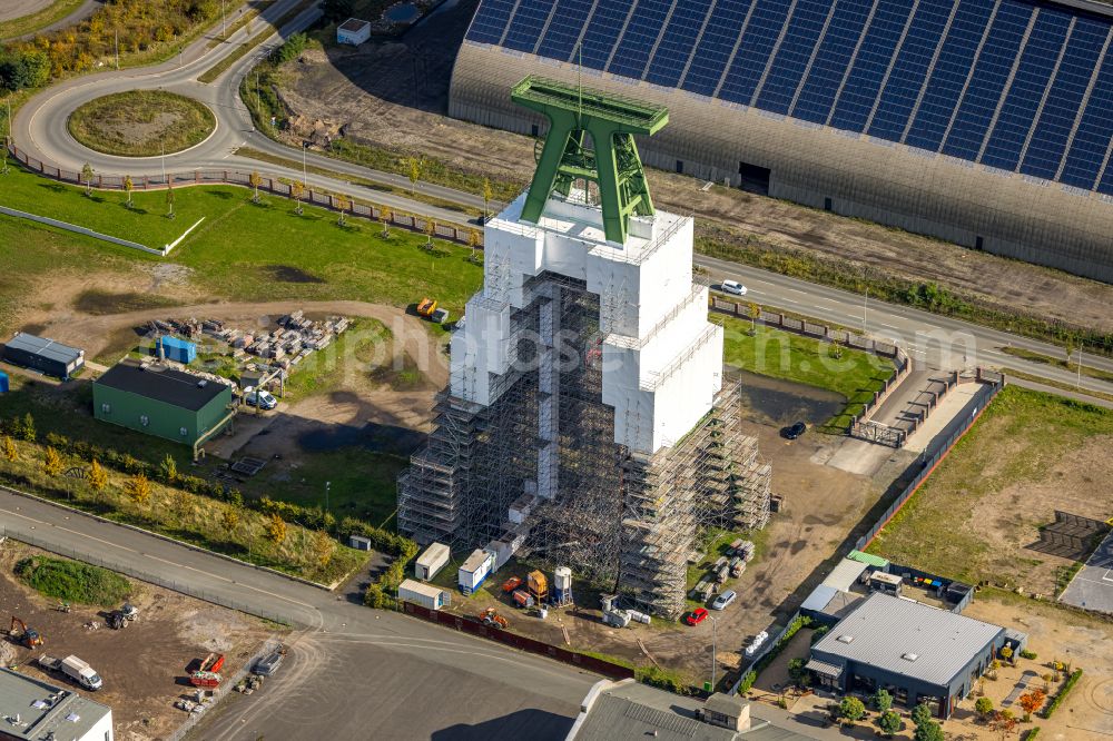 Dinslaken from above - Conveyors and mining pits at the headframe of Zentralwerkstatt Zeche Lohberg in Dinslaken in the state North Rhine-Westphalia, Germany