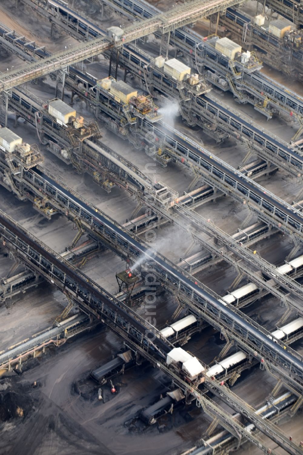 Aerial image Niederzier - Mining shaft tower Conveyor belts and transport routes hard coal revier of RWE AG in Niederzier in the state North Rhine-Westphalia