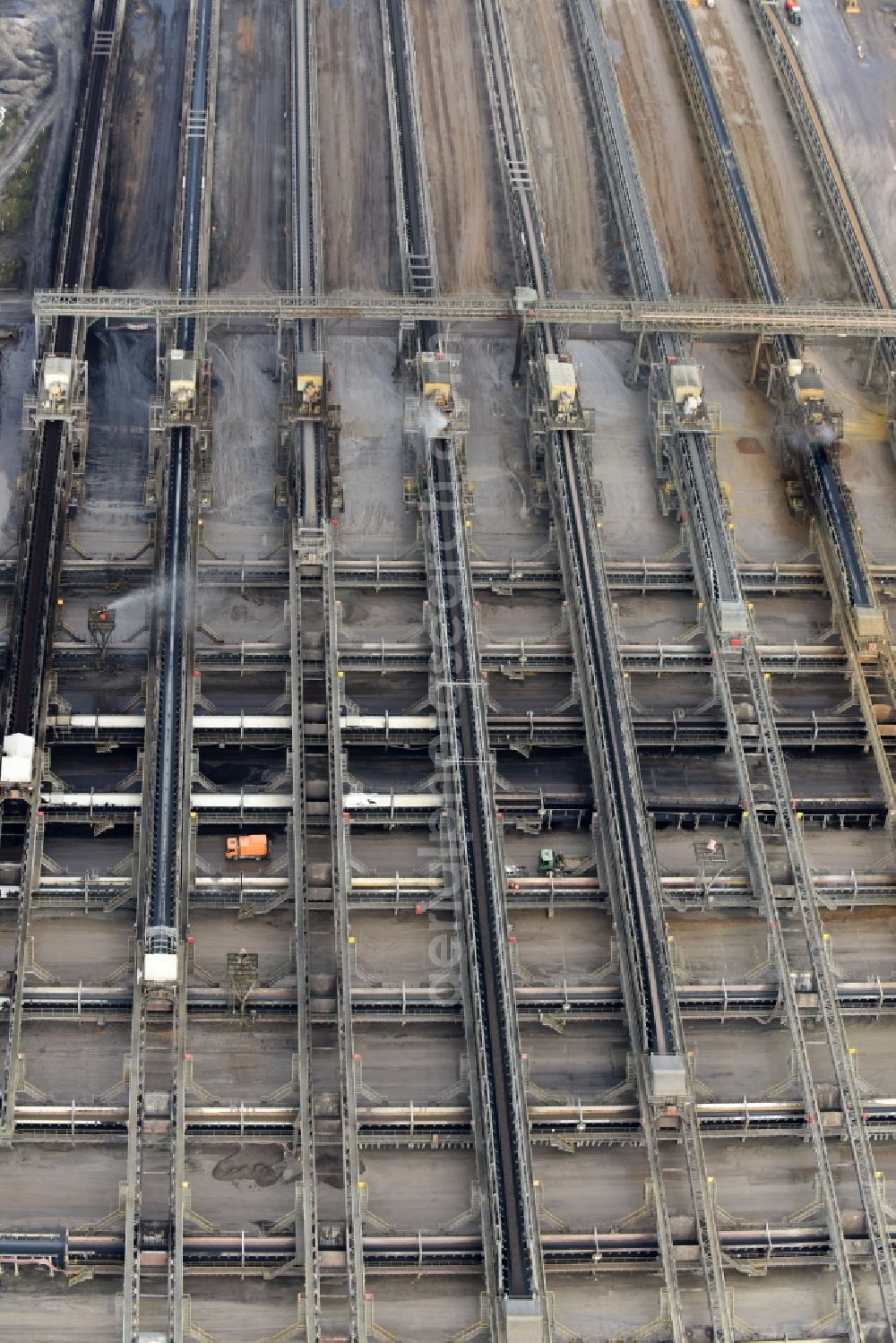 Niederzier from above - Mining shaft tower Conveyor belts and transport routes hard coal revier of RWE AG in Niederzier in the state North Rhine-Westphalia