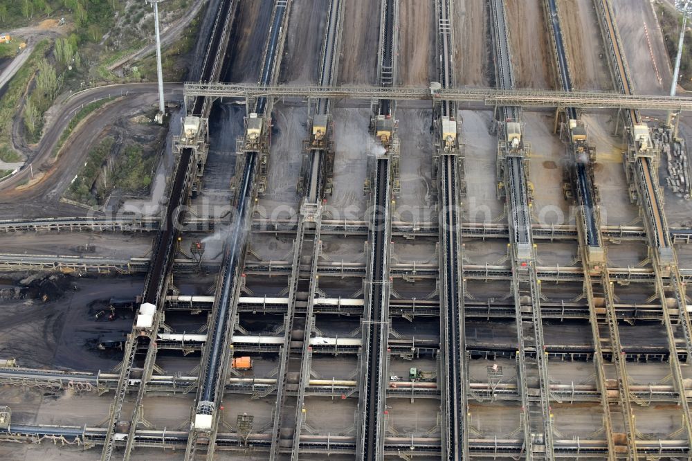 Niederzier from the bird's eye view: Mining shaft tower Conveyor belts and transport routes hard coal revier of RWE AG in Niederzier in the state North Rhine-Westphalia