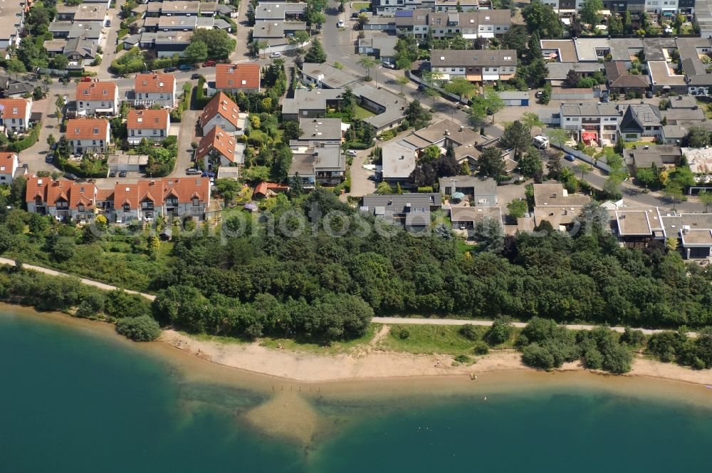 Köln from the bird's eye view: Sandy beach areas on the Pescher See on Pestalozzistrasse in the district Chorweiler in Cologne in the state North Rhine-Westphalia, Germany