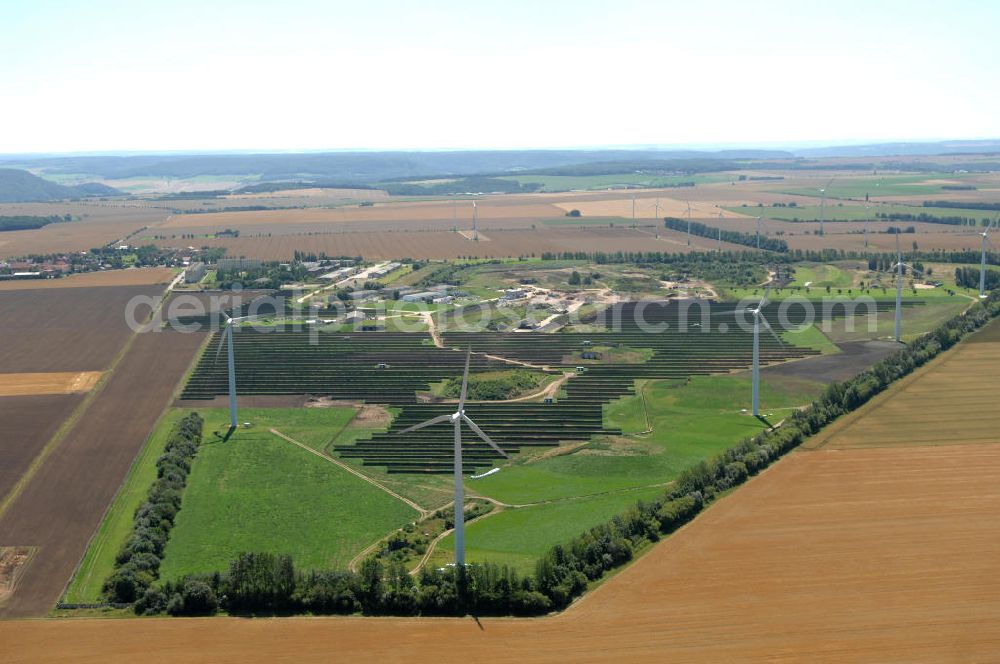 Eckolstädt from the bird's eye view: Blick auf das Freifeld-Solarkraftwerk im Saaletal bei Eckolstädt in Thüringen. Diese Solarstromanlage entstand 2008 und kann Elektrizität für rund 2.500 Haushalte erzeugen. Die 32 Hektar große Photovoltaikanlage ist eine der größten ihrer Art in Deutschland. Bauherr: Beck Energy GmbH,