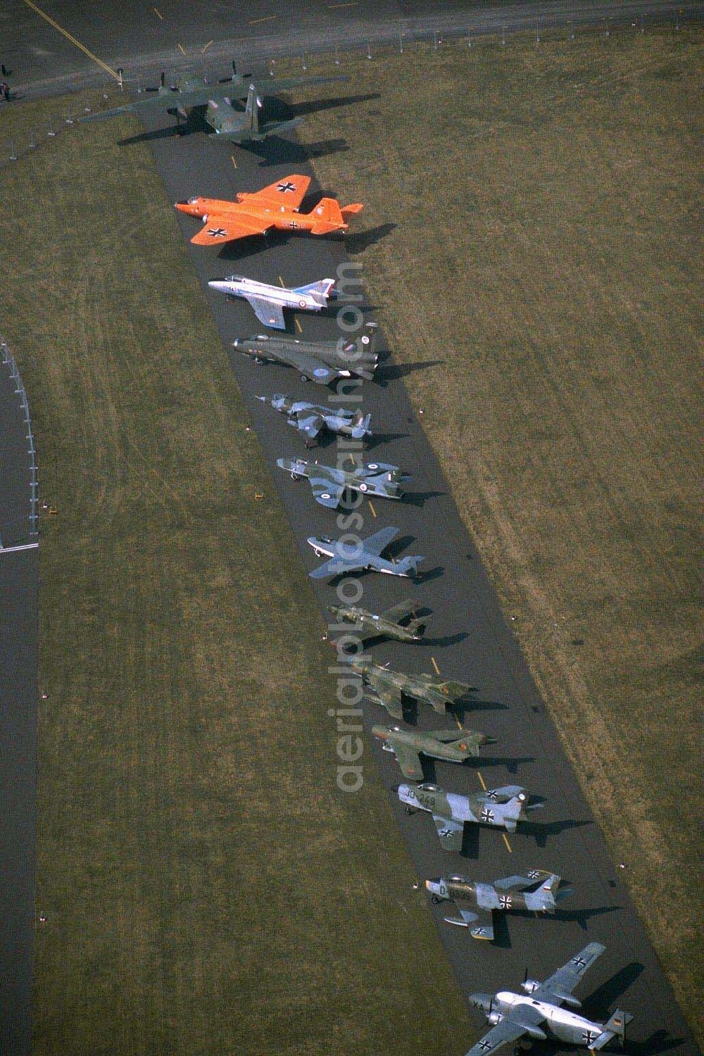 Aerial image Berlin - Freiflächen des Luftwaffenmuseums Gatow (ehem. Flugplatz der Royal Air Force). Was sich einst zwischen Warschauer Vertrag und NATO tagtäglich gegenseitig auflauerte, steht hier nun Seite an Seite vereint... Luftbild: Robert Grahn