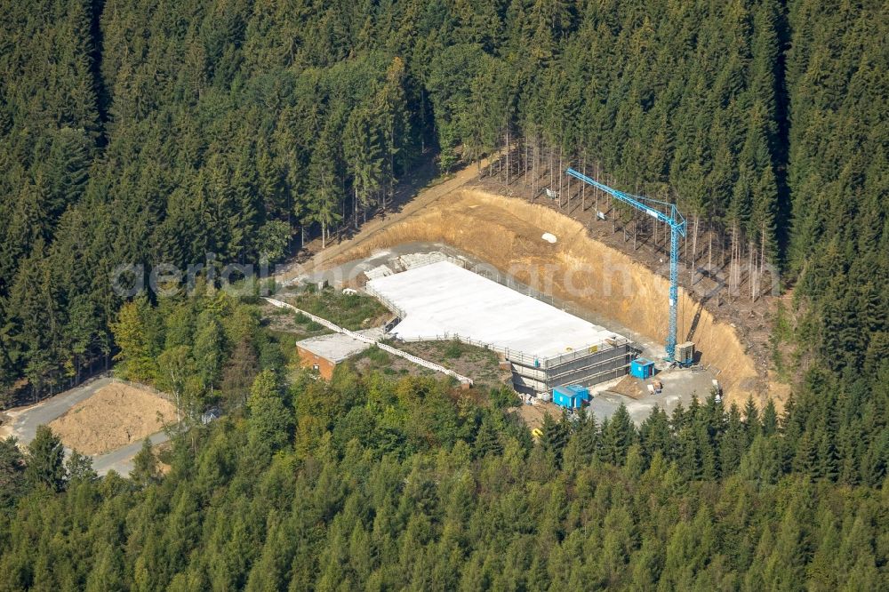 Aerial photograph Hilchenbach - As part of the rehabilitation and repair exposed ground of the water reservoir and retention basin at the Breitenbachtalsperre in Hilchenbach in the state North Rhine-Westphalia, Germany