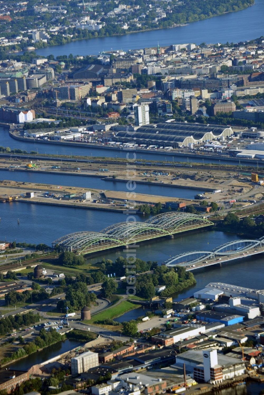 Hamburg from above - View of the Freihafen-Elbrücke and the railway bridges. The Freihafen-Elbrücke was completed in 1929, because the free port required a structually separated crossing of the Elbe. The bridges are of great importance for the Hanseatic city, as they ensure the transport and traffic connection of Hamburg on the Elbe