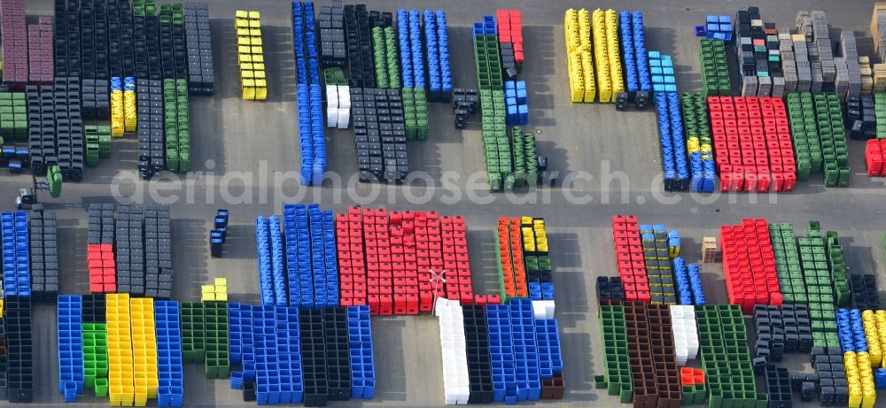 Aerial photograph Neuruppin - Free storage space colorful plastic tonnes in production facilities of Otto Disposal Systems in Neuruppin in Brandenburg