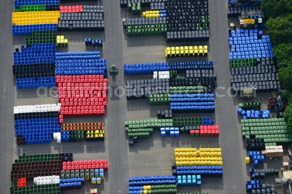 Aerial photograph Neuruppin - Free storage space colorful plastic tonnes in production facilities of Otto Disposal Systems in Neuruppin in Brandenburg