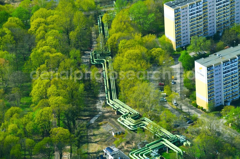 Berlin from the bird's eye view: Overhead pipes for district heating supply along the Rhinstrasse in the district Lichtenberg in Berlin, Germany