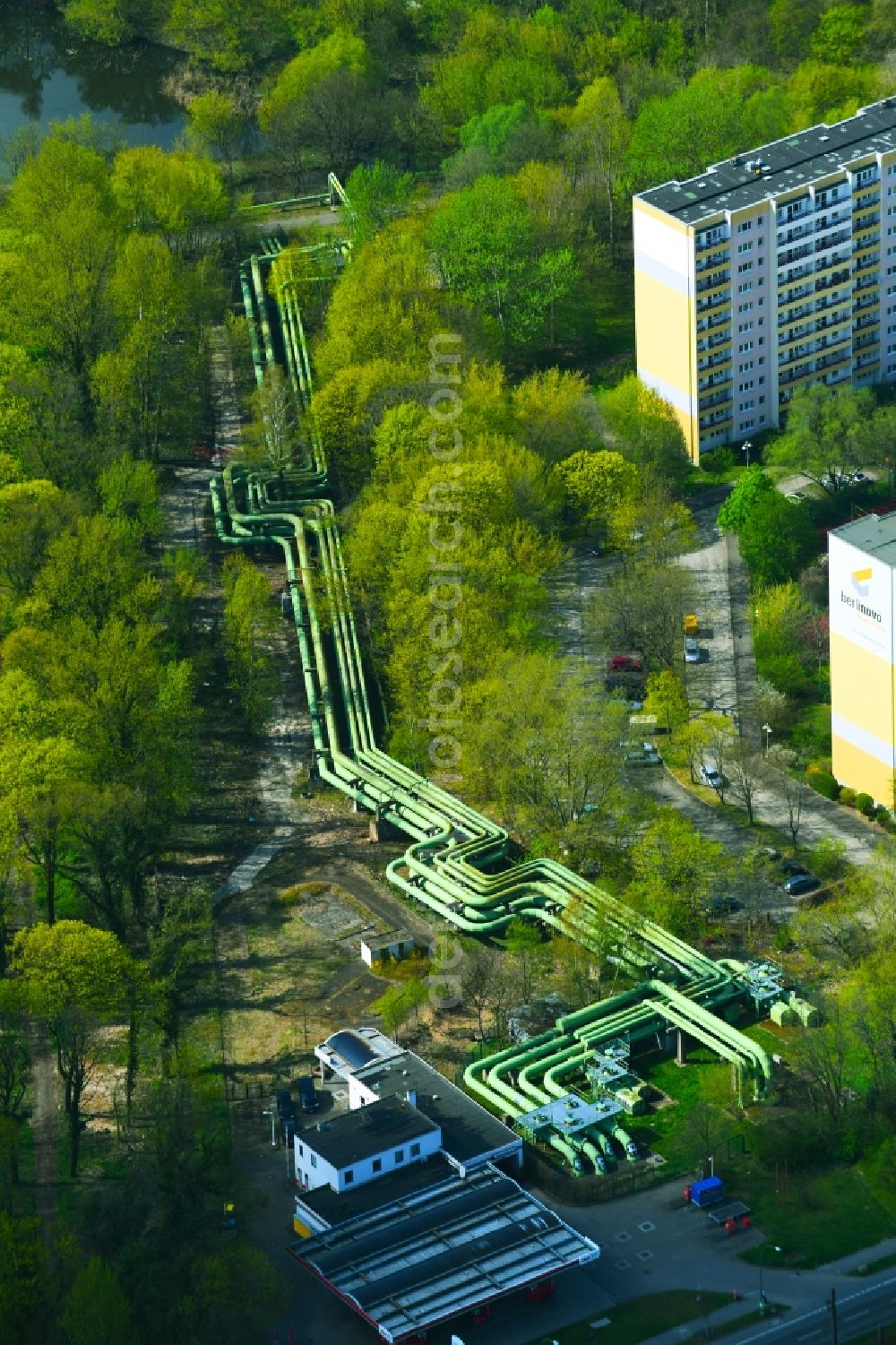 Aerial image Berlin - Overhead pipes for district heating supply along the Rhinstrasse in the district Lichtenberg in Berlin, Germany