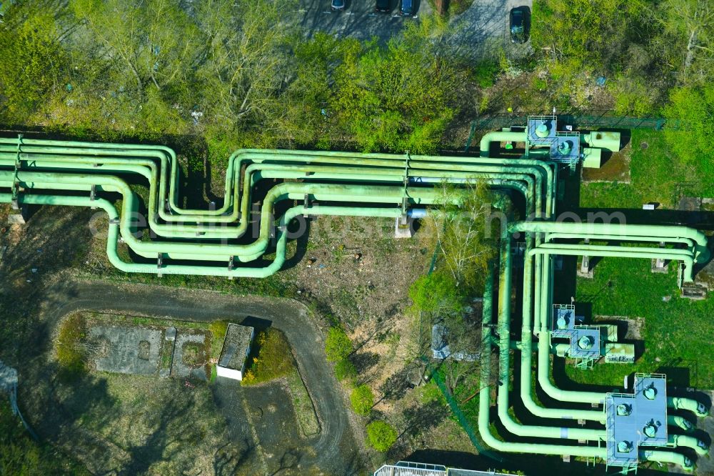 Berlin from the bird's eye view: Overhead pipes for district heating supply along the Rhinstrasse in the district Lichtenberg in Berlin, Germany