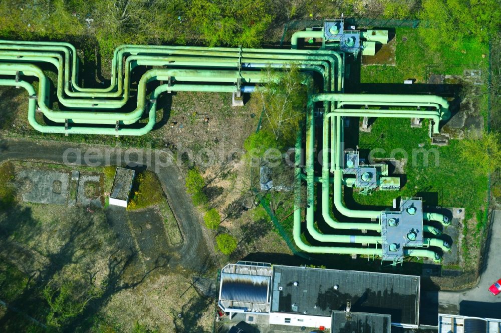 Aerial image Berlin - Overhead pipes for district heating supply along the Rhinstrasse in the district Lichtenberg in Berlin, Germany