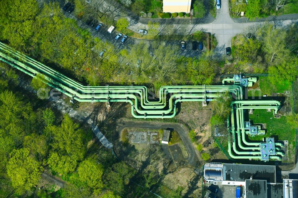 Berlin from above - Overhead pipes for district heating supply along the Rhinstrasse in the district Lichtenberg in Berlin, Germany