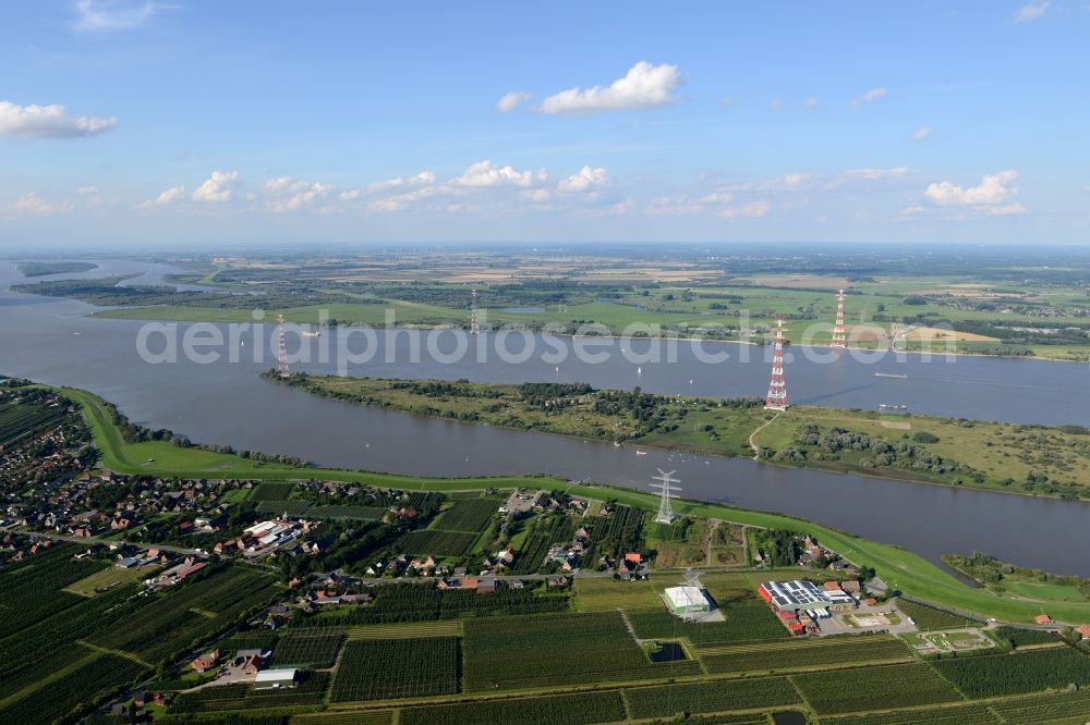 Aerial photograph Steinkirchen - Pylons on the Luehesand stone churches in Lower Saxony. The 189 and 227 meters high pylons of Elbe crossing 1 and 2 are on Luehesand. They are the highest pylons in Europe and grant still the required passage height of 75 meters at the deepest point of the sagging lines over the river Elbe