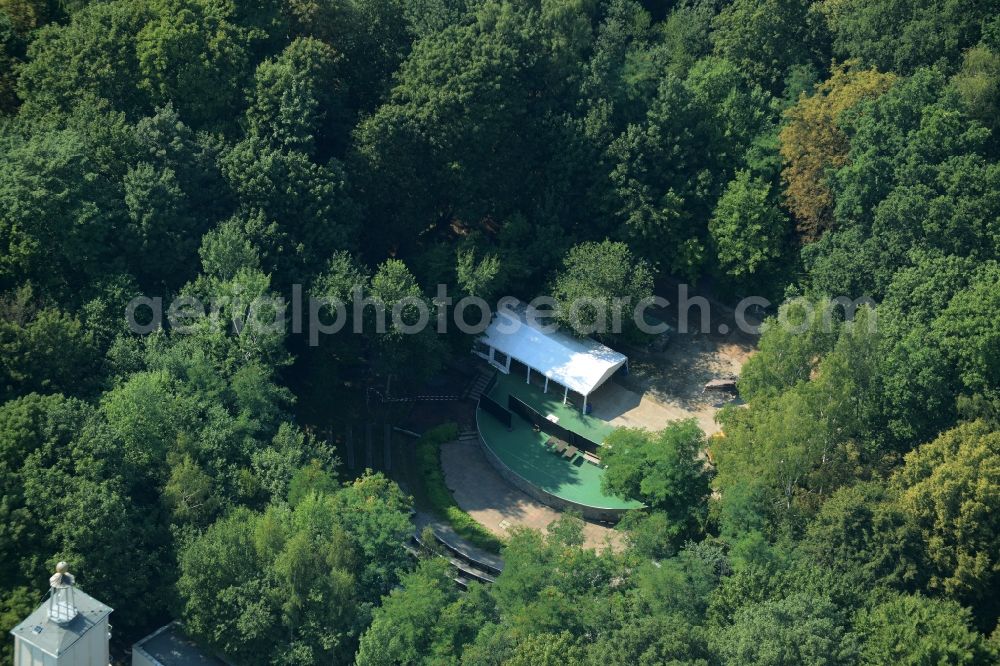 Aerial photograph Chemnitz - Construction of the building of the open-air theater Kuechwaldbuehne in Chemnitz in the state of Saxony. Parts of the stage, a white tent and seating facilities are visible