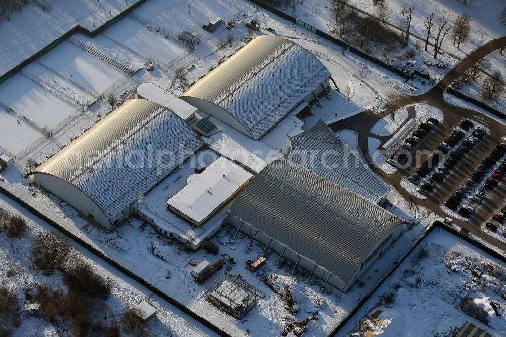 Aerial image Magdeburg - Winterly snowy building of the leisure facility LIFE im Herrenkrug GmbH & Co. KG besides the road Herrenkrugstrasse in Magdeburg in the state Saxony-Anhalt