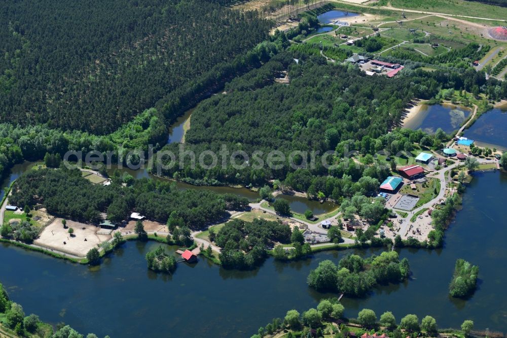 Oranienburg from above - Fun Park Germendorf in Oranienburg in the state of Brandenburg. The park, zoo and playground with its pools and childrens facilities is located on the shores of the Waldseen lakes in the West of the Germendorf part of Oranienburg