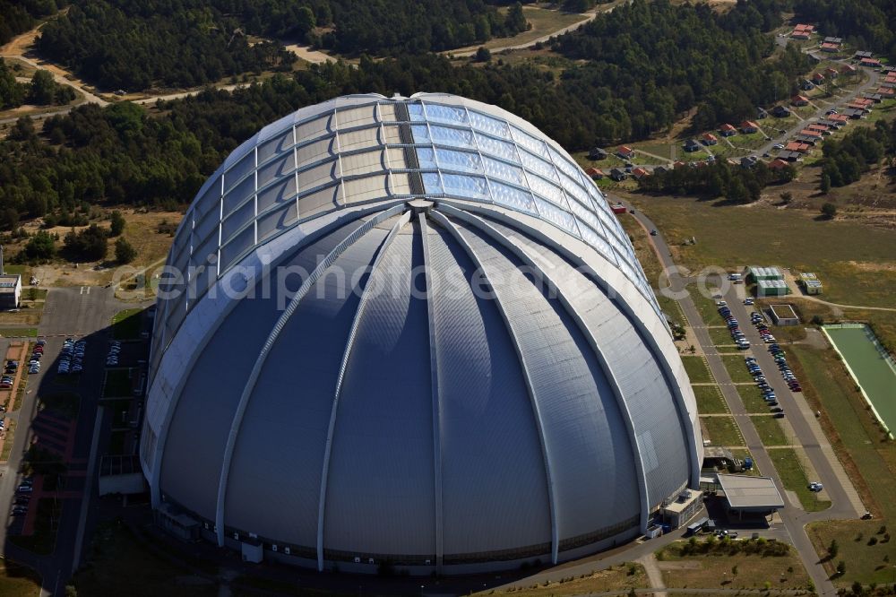 Aerial photograph Krausnick - Tthe amusement park Tropical Islands in the former Chargolifterhalle in Krausnick Half / in the state of Brandenburg. The former CargoLifter airship hangar (called Aerium) is the largest self-supporting hall in the earth