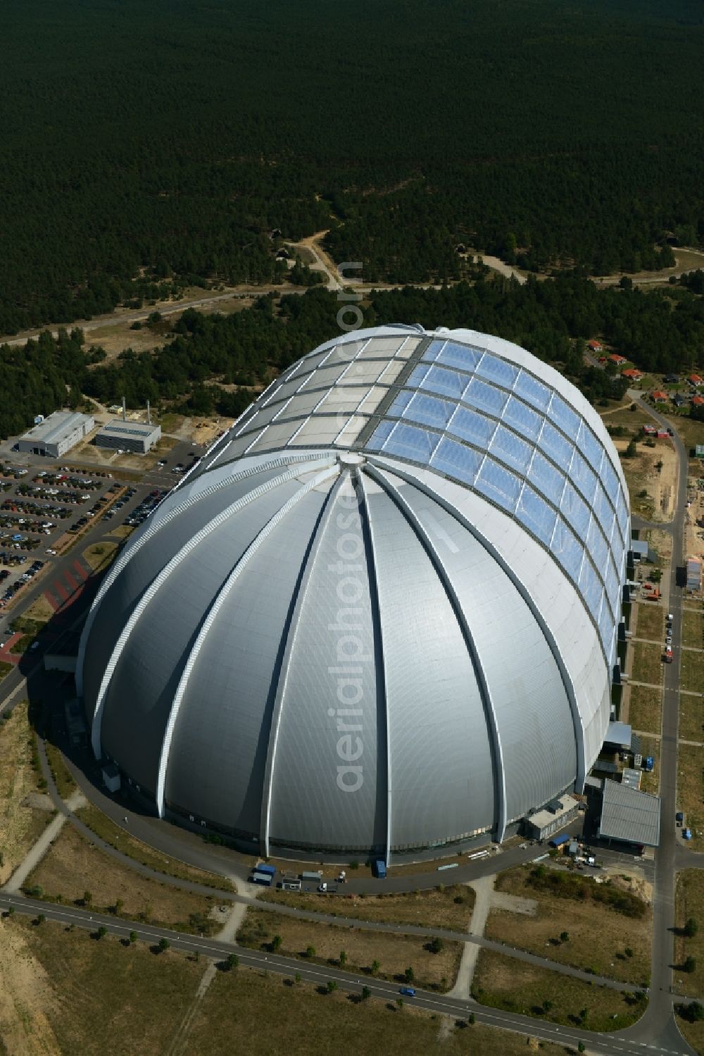 Aerial image Halbe - Tthe amusement park Tropical Islands in the former Chargolifterhalle in Krausnick Half / in the state of Brandenburg. The former CargoLifter airship hangar (called Aerium) is the largest self-supporting hall in the earth