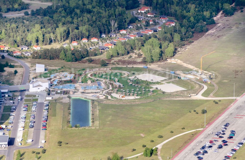 Aerial image Krausnick - Complete complex of the Theme Park Tropical Islands with air hall, outdoor pool, campsite, holiday homes and former airfield on street Tropical-Islands-Allee in Krausnick in the state of Brandenburg, Germany