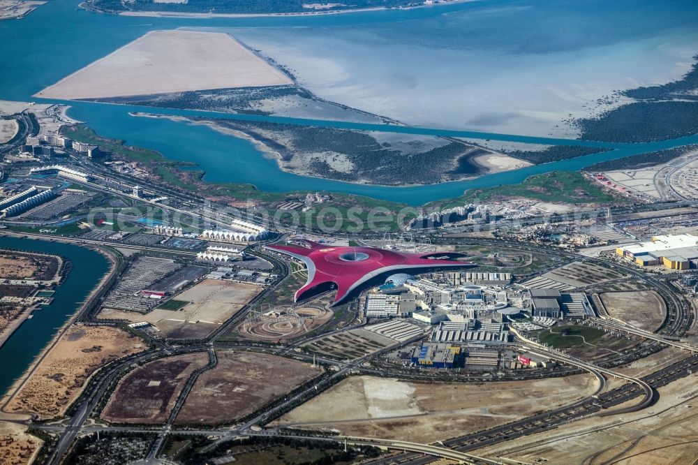 Abu Dhabi from the bird's eye view: Leisure Centre - Amusement Park Ferrari World and Einkaufszentrum Yas Mall in Abu Dhabi in United Arab Emirates