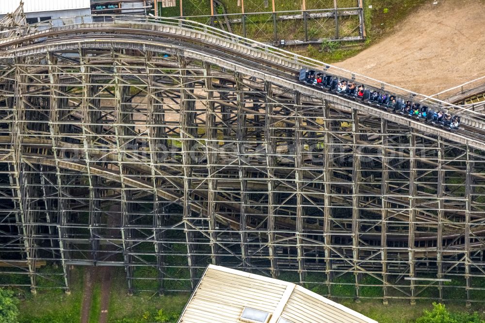 Aerial image Bottrop - Wooden roller coaster The Bandit in the theme park and amusement park Movie Park Germany on Warner-Allee in Bottrop in the Ruhr area in the federal state of North Rhine-Westphalia, Germany