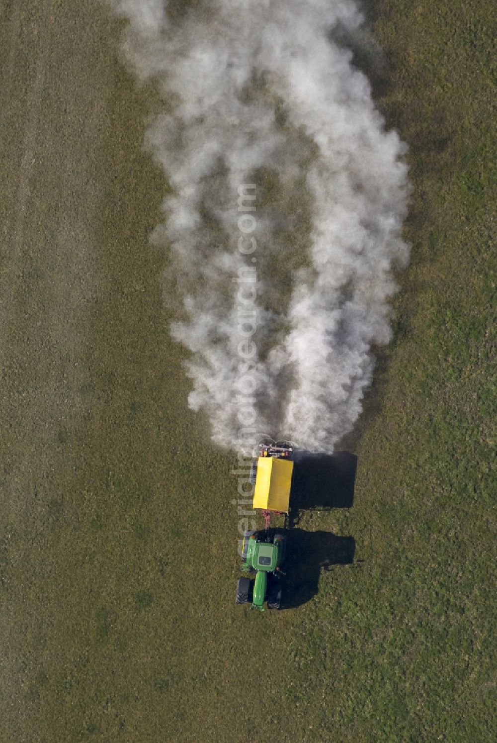 Aerial photograph Marl - Spring farming work by liming a lawn in Marl in North Rhine-Westphalia