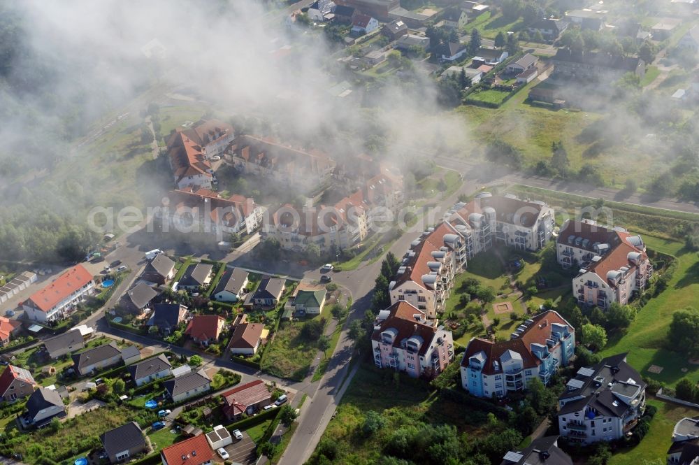 Werneuchen from above - View at a new housing estate in Werneuchen OT Seefeld at Krummenseer Road in Brandenburg in the morning mist