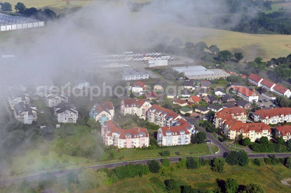 Werneuchen from the bird's eye view: View at a new housing estate in Werneuchen OT Seefeld at Krummenseer Road in Brandenburg in the morning mist