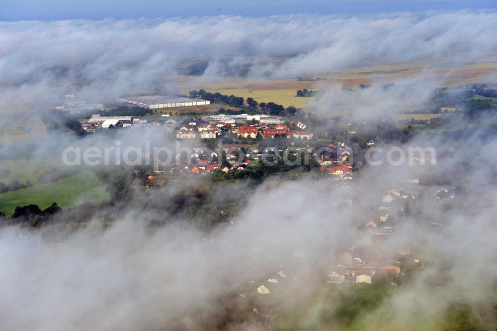 Werneuchen from the bird's eye view: View at a new housing estate in Werneuchen OT Seefeld at Krummenseer Road in Brandenburg in the morning mist