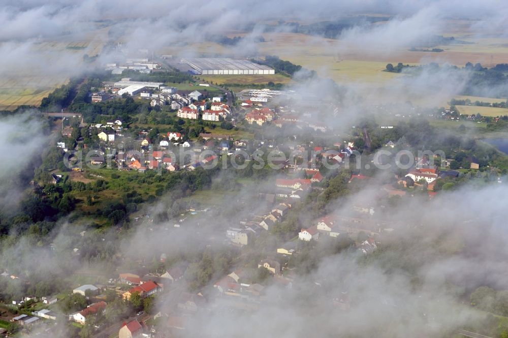 Werneuchen from above - View at a new housing estate in Werneuchen OT Seefeld at Krummenseer Road in Brandenburg in the morning mist