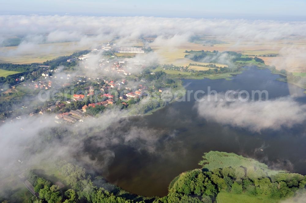 Werneuchen from the bird's eye view: View at a new housing estate in Werneuchen OT Seefeld at Krummenseer Road in Brandenburg in the morning mist