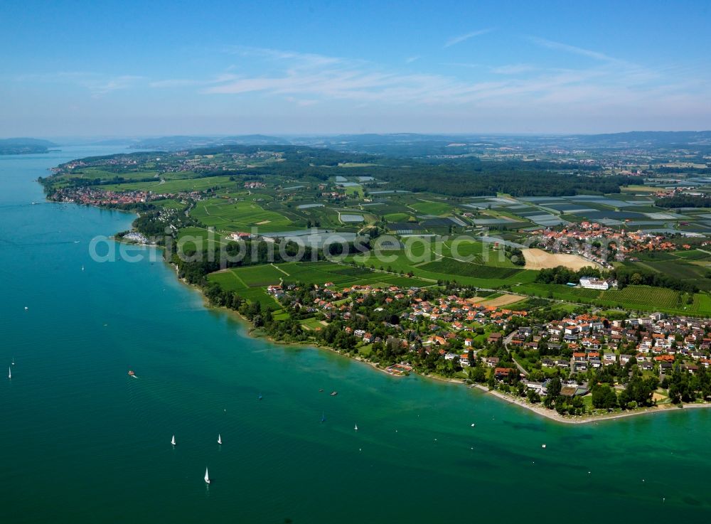 Friedrichshafen from above - Friedrichshafen on the Lake Constance in the state of Baden-Württemberg. The university town is located on the northern shore of the lake. It is the district capital of the Lake Constance district, its largest town and the second largest on the lake after the city of Constance. View from the East on the shore