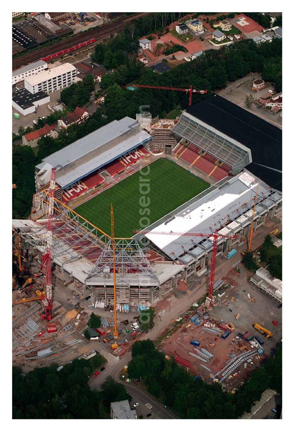 Aerial image Kaiserslautern (Rheinland-Pfalz ) - Blick auf das Fritz-Walter-Stadion des 1. FC Kaiserslautern. Der Erweiterungbau seit 2002 auf 48.500 Sitzplätze (Osterweiterung) wird im November 2005 abgeschlossen sein. Das Fritz-Walter-Stadion ist einer von 12 Austragungsorte bei der Fußball WM 2006.The Fritz-Walter soccer stadium in Kaiserslautern is seen in this August 28, 2005 file picture.