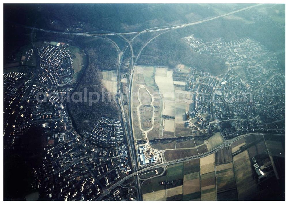 Aerial photograph Rüsselsheim / Hessen - Bau des Gewerbegebietes der HVB-Immobilienmanagement AG an der Autobahnabfahrt Rüsselsheim - Mitte in Rüsselsheim / Hessen. Aufnahmen aus 6000 ft Höhe nur möglich, da Objekt direkt in der westlichen Einflugsschneise des Frankfurter Flughafens liegt !!