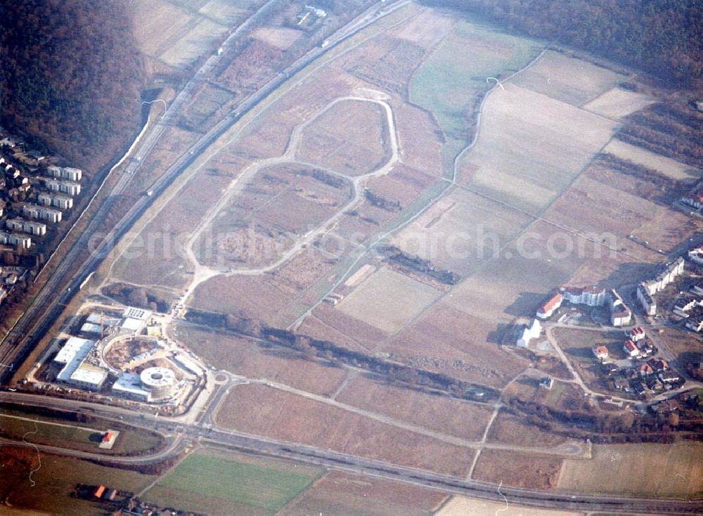 Aerial image Rüsselsheim / Hessen - Bau des Gewerbegebietes der HVB-Immobilienmanagement AG an der Autobahnabfahrt Rüsselsheim - Mitte in Rüsselsheim / Hessen. Aufnahmen aus 6000 ft Höhe nur möglich, da Objekt direkt in der westlichen Einflugsschneise des Frankfurter Flughafens liegt !!