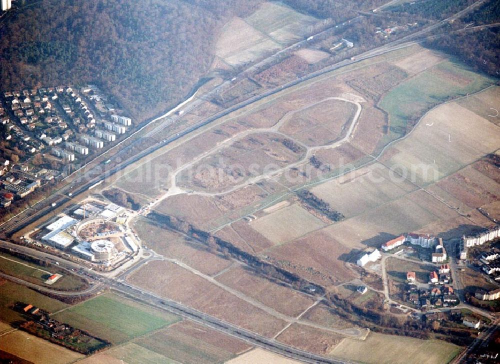 Aerial image Rüsselsheim / Hessen - Bau des Gewerbegebietes der HVB-Immobilienmanagement AG an der Autobahnabfahrt Rüsselsheim - Mitte in Rüsselsheim / Hessen. Aufnahmen aus 6000 ft Höhe nur möglich, da Objekt direkt in der westlichen Einflugsschneise des Frankfurter Flughafens liegt !!