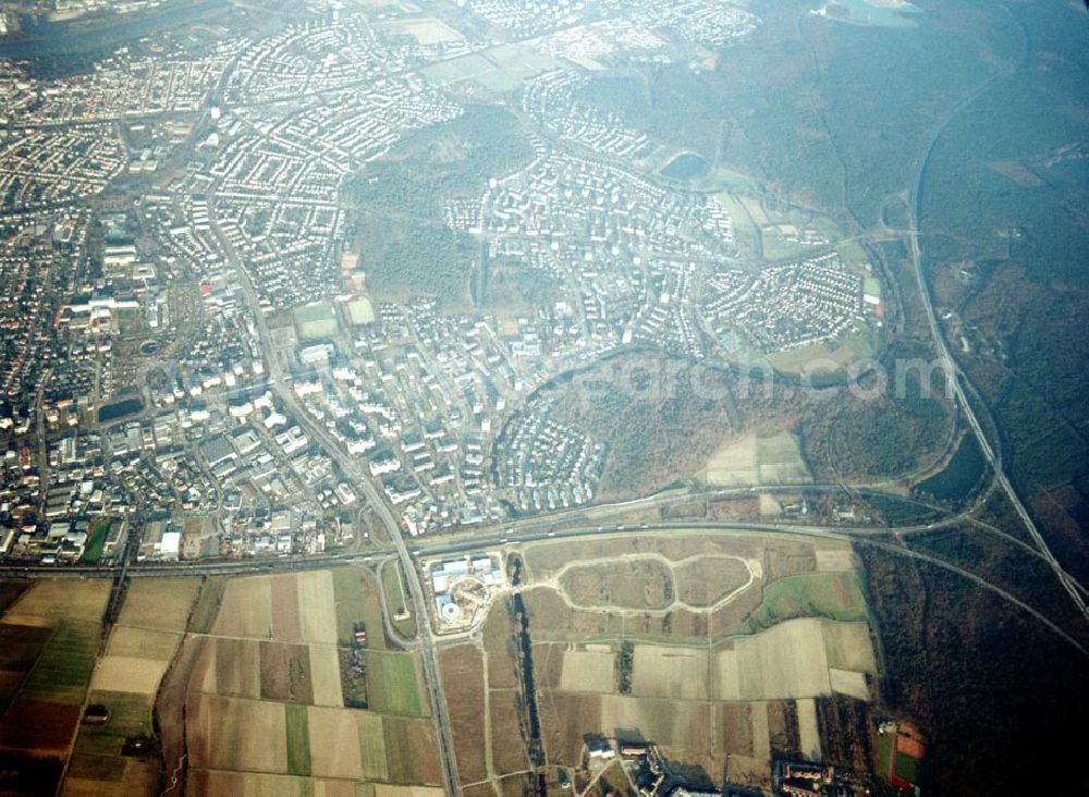 Rüsselsheim / Hessen from the bird's eye view: Bau des Gewerbegebietes der HVB-Immobilienmanagement AG an der Autobahnabfahrt Rüsselsheim - Mitte in Rüsselsheim / Hessen. Aufnahmen aus 6000 ft Höhe nur möglich, da Objekt direkt in der westlichen Einflugsschneise des Frankfurter Flughafens liegt !!