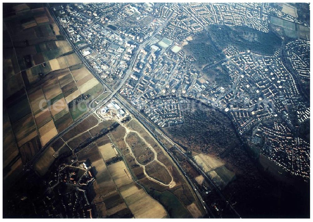 Aerial photograph Rüsselsheim / Hessen - Bau des Gewerbegebietes der HVB-Immobilienmanagement AG an der Autobahnabfahrt Rüsselsheim - Mitte in Rüsselsheim / Hessen. Aufnahmen aus 6000 ft Höhe nur möglich, da Objekt direkt in der westlichen Einflugsschneise des Frankfurter Flughafens liegt !!