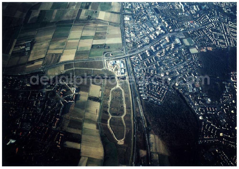 Aerial image Rüsselsheim / Hessen - Bau des Gewerbegebietes der HVB-Immobilienmanagement AG an der Autobahnabfahrt Rüsselsheim - Mitte in Rüsselsheim / Hessen. Aufnahmen aus 6000 ft Höhe nur möglich, da Objekt direkt in der westlichen Einflugsschneise des Frankfurter Flughafens liegt !!