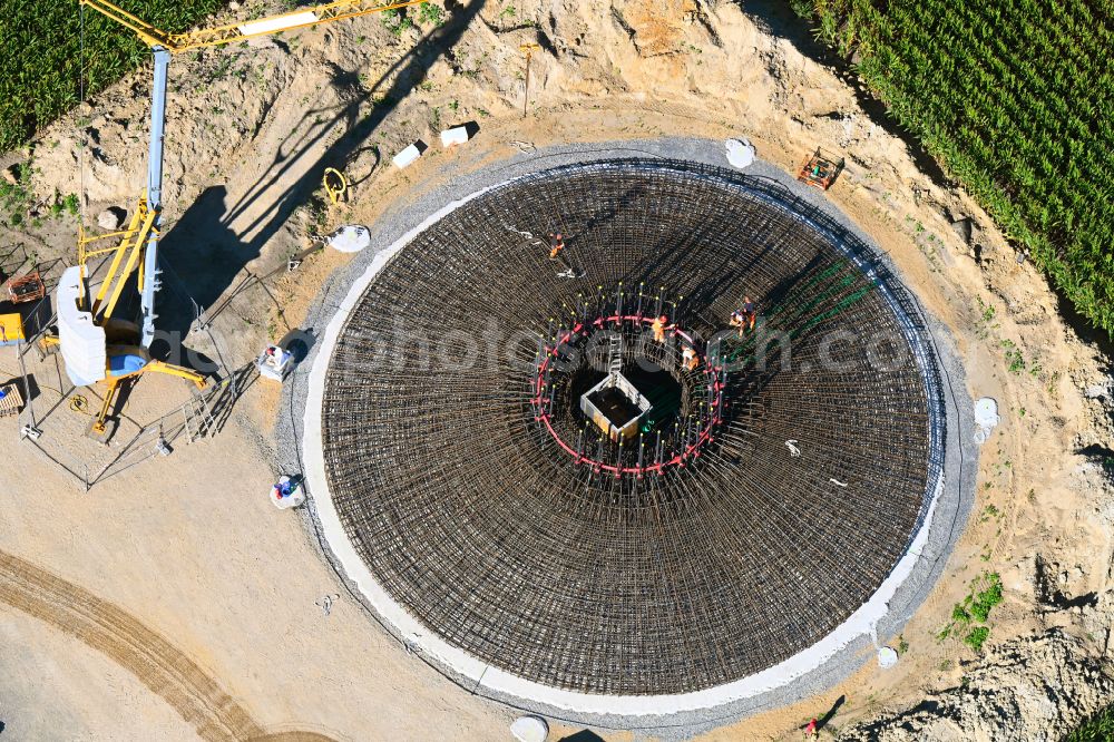 Aerial image Gerdshagen - Construction site for the construction of the steel reinforcement of the foundation for the wind turbine tower assembly on a field in Gerdshagen in the state Brandenburg, Germany